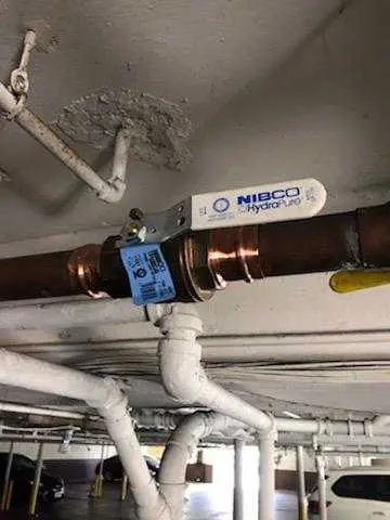 Copper pipe repair and valve work for Backflow Testing in Paris